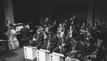 A fifteen-piece big band and four ...